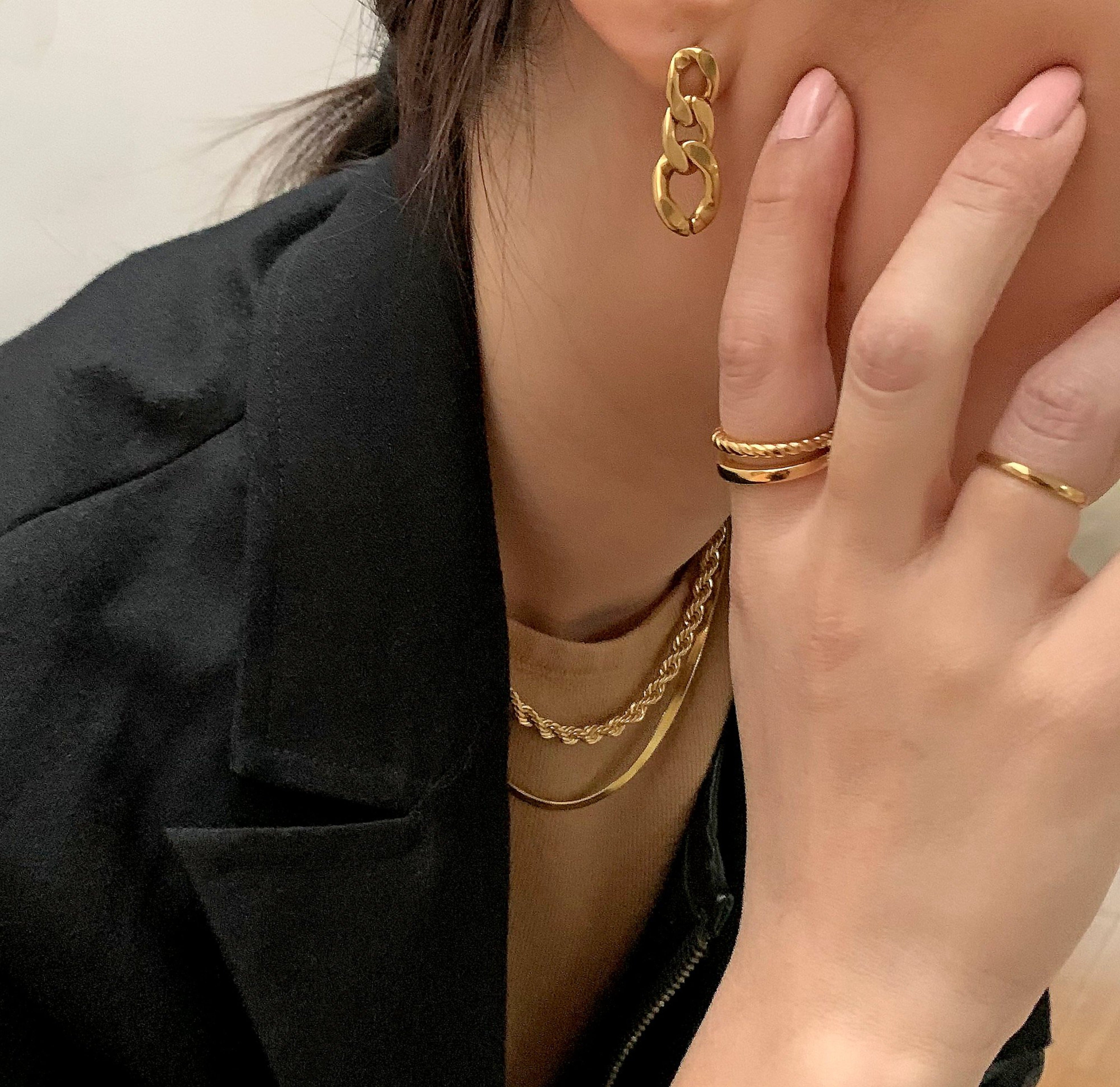 Didi thin gold ring band worn on model with Birdy duo ring,  waterproof rings