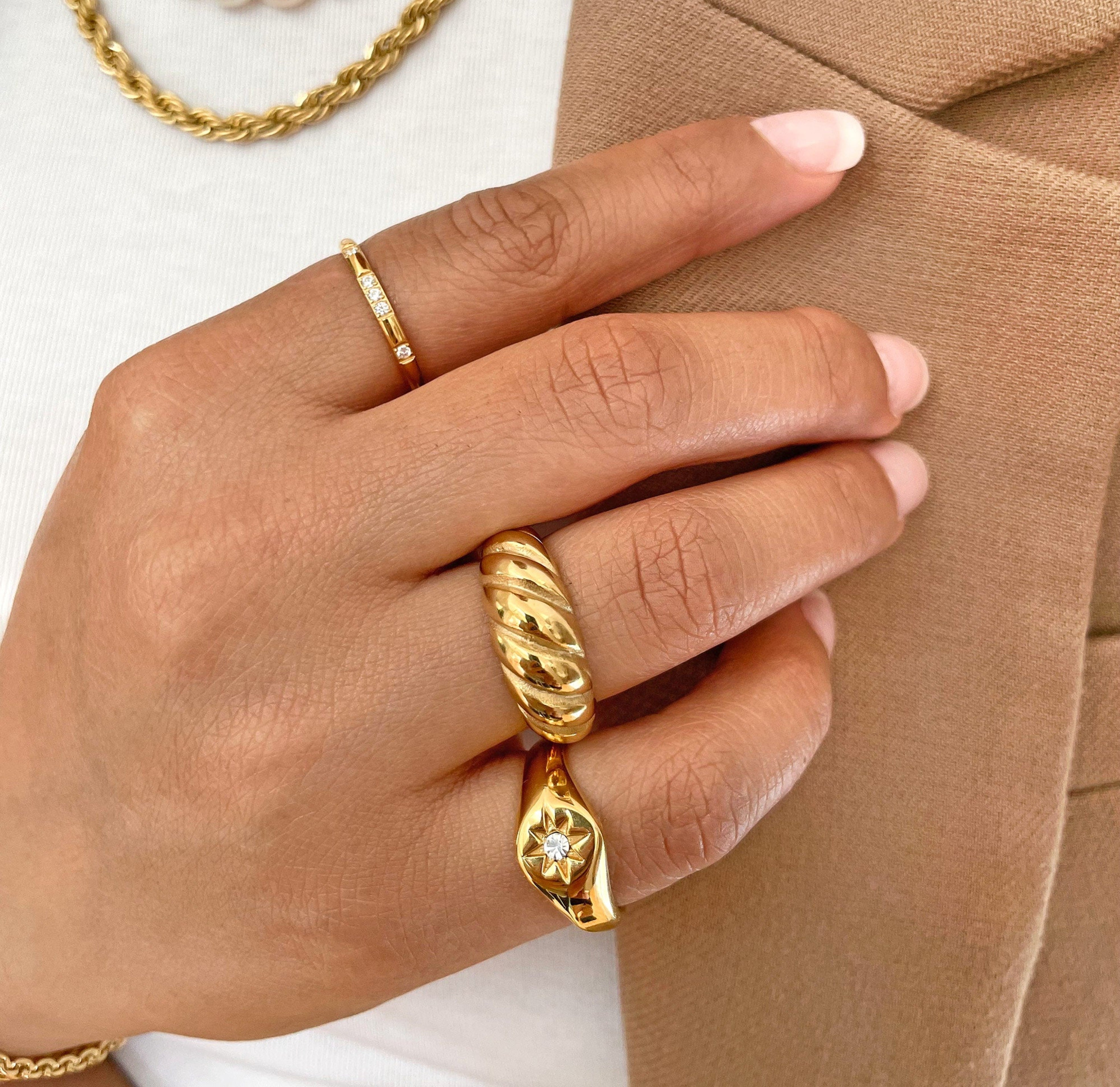 gold star signet ring gold jewelry waterproof rings worn as pinky ring stacked with the Margaux croissant ring and veda gold ring