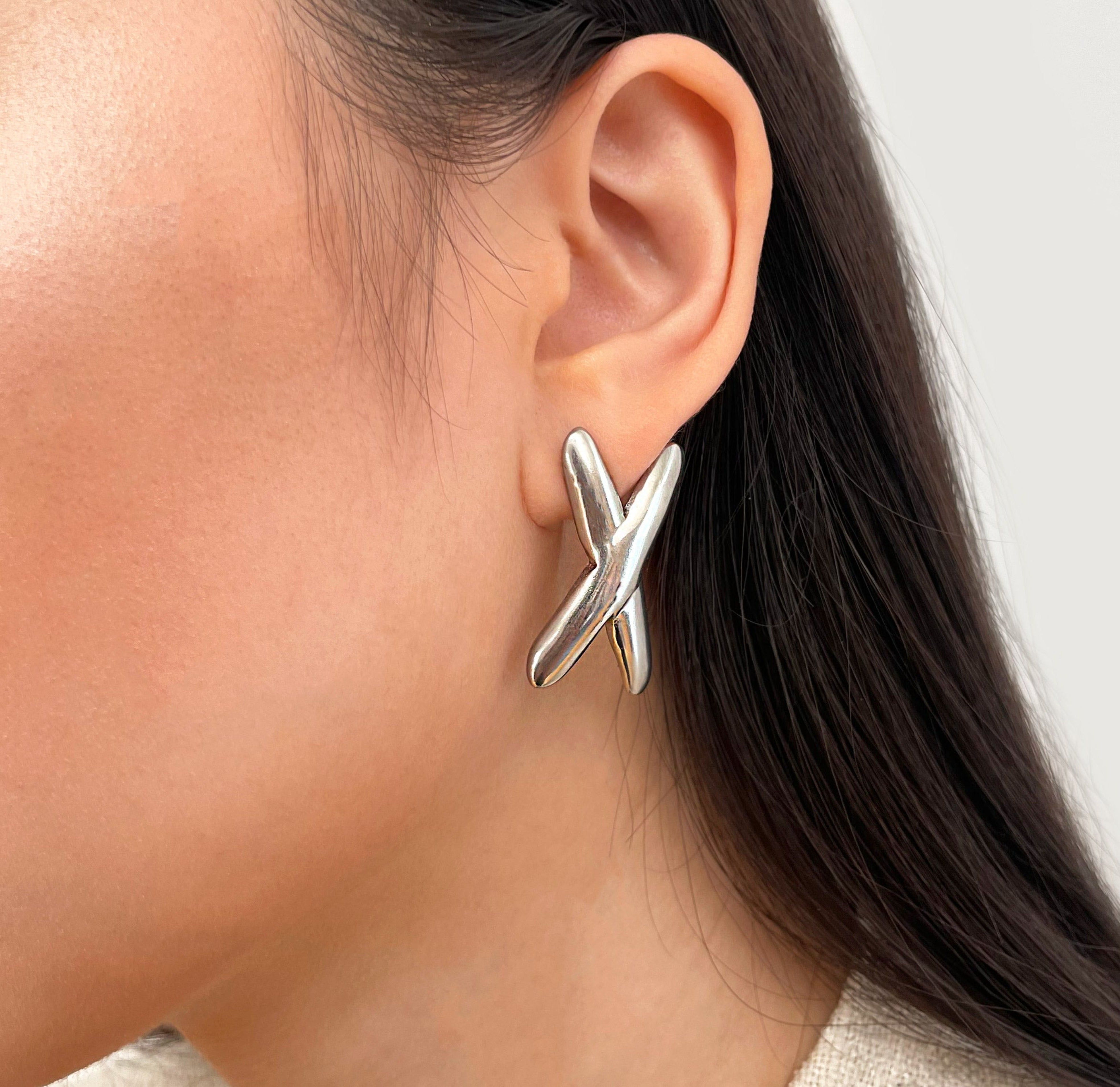 silver X earrings waterproof jewelry