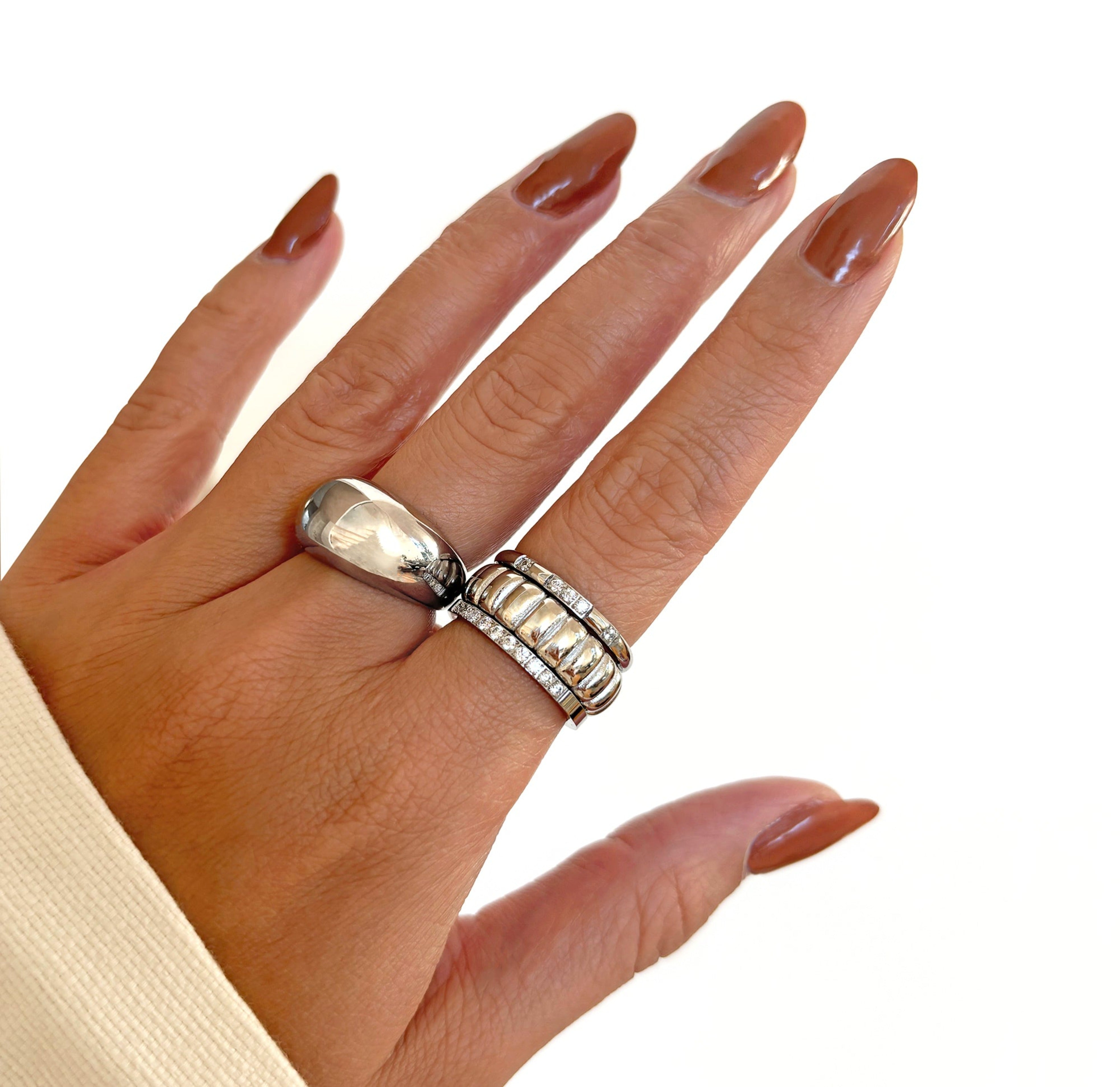 Silver bubbkenring stacked with Harriet ribbed ring. Silver waterproof jewelry
