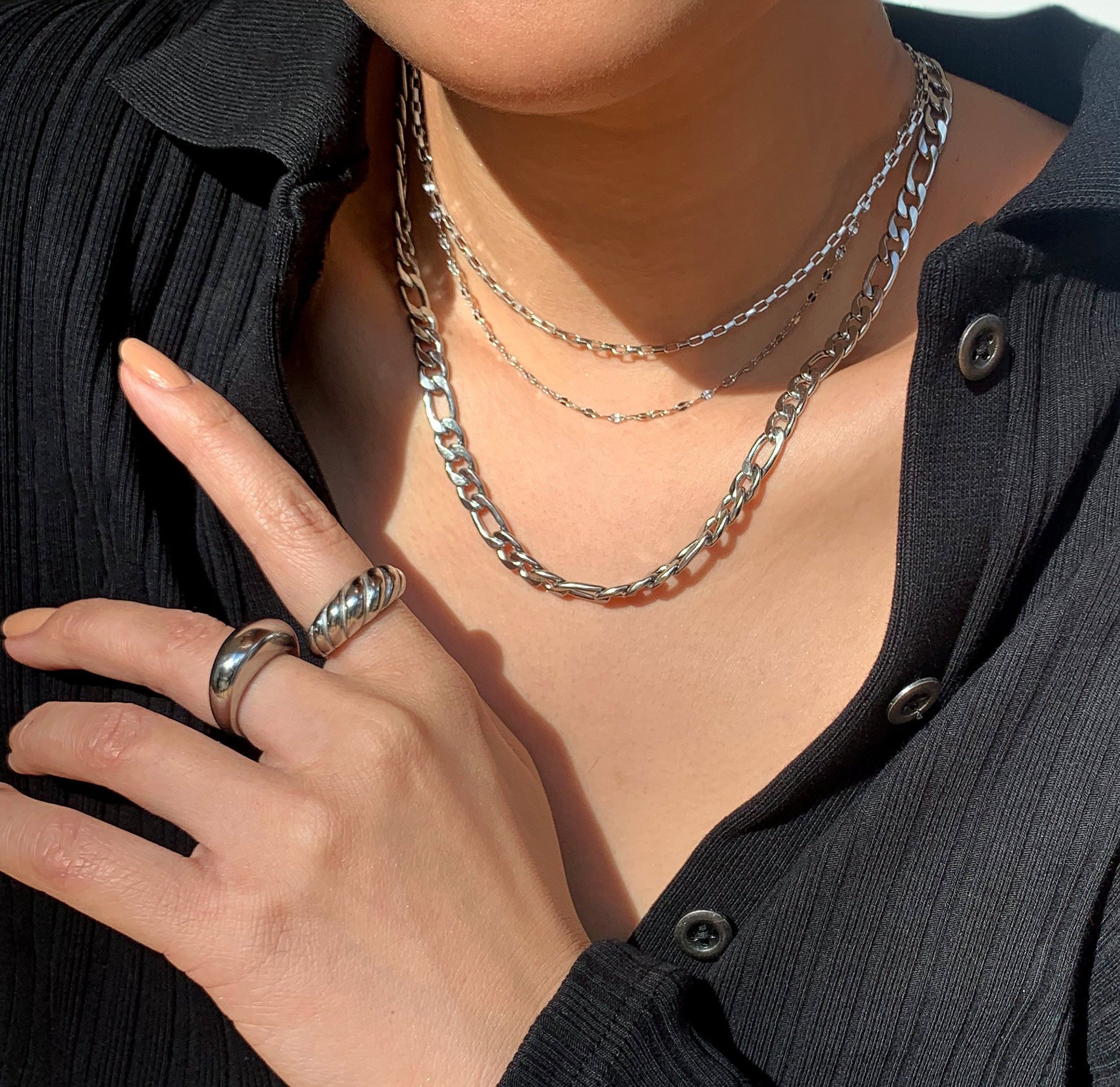 silver capri dome ring paired with silver Margaux croissant ring worn on model. silver jewelry tarnish free
