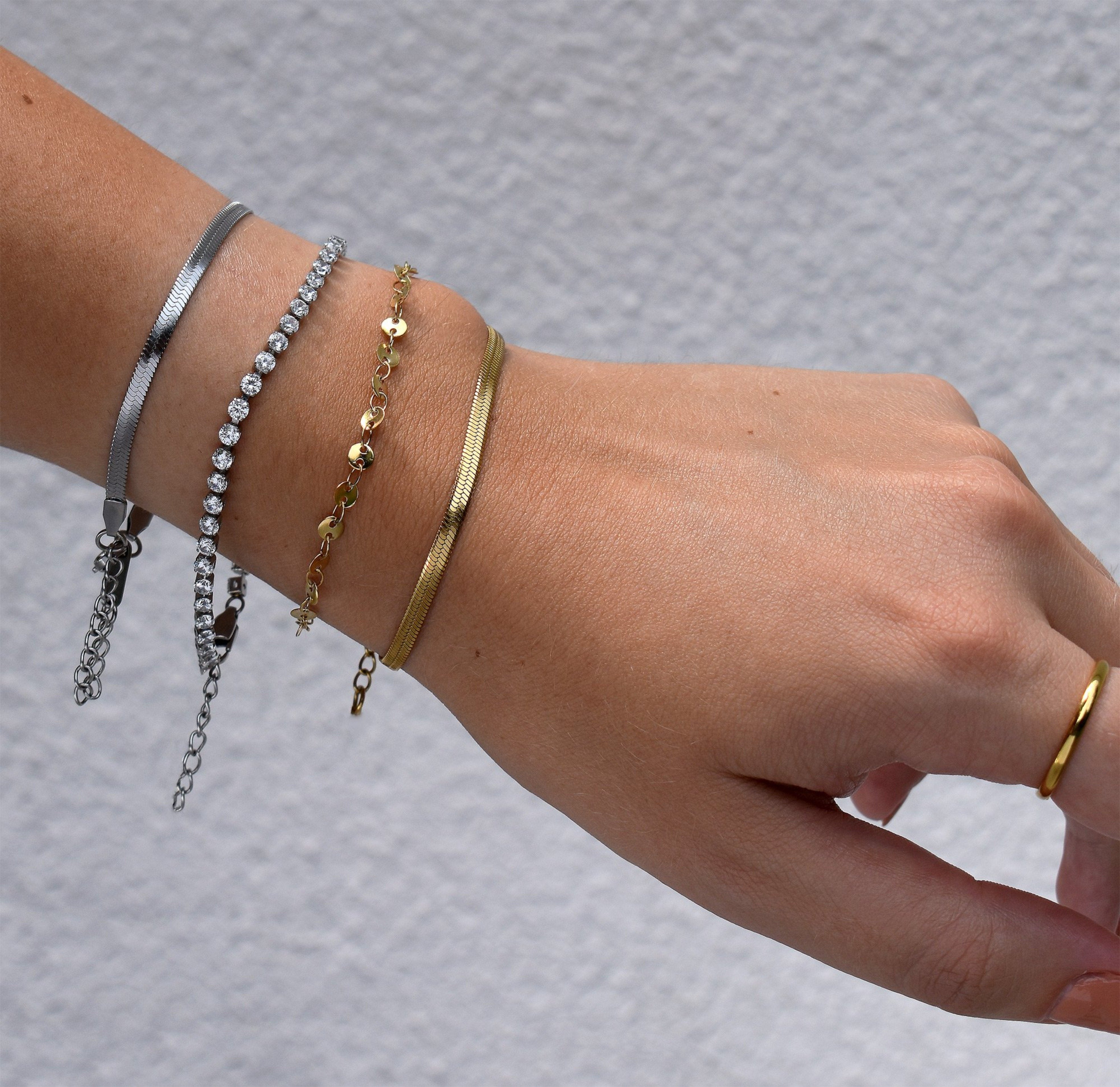 silver and gold bracelets