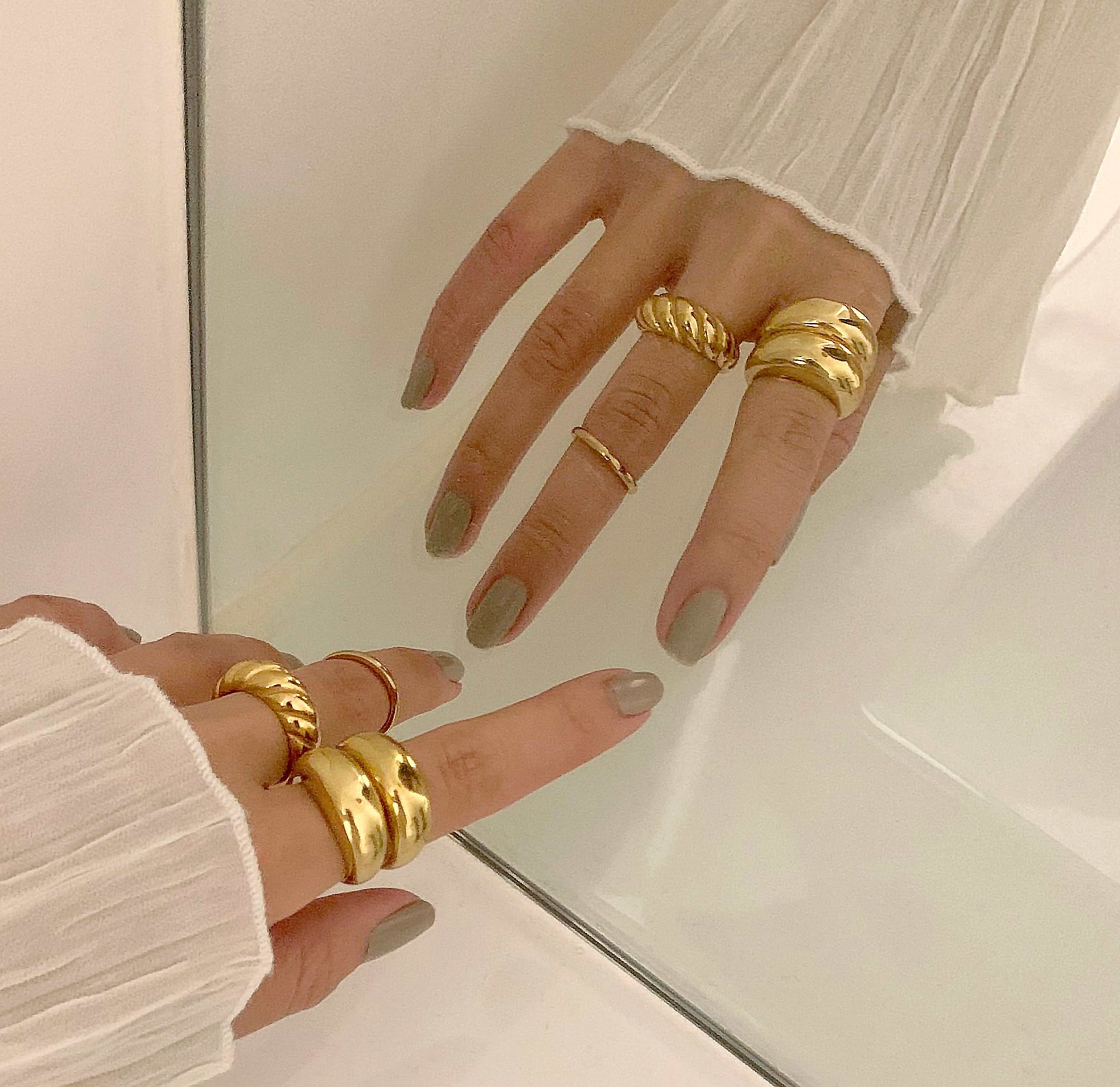 Didi thin gold ring band paired with capri gold dome ring and gold Margaux croissant ring, waterproof rings