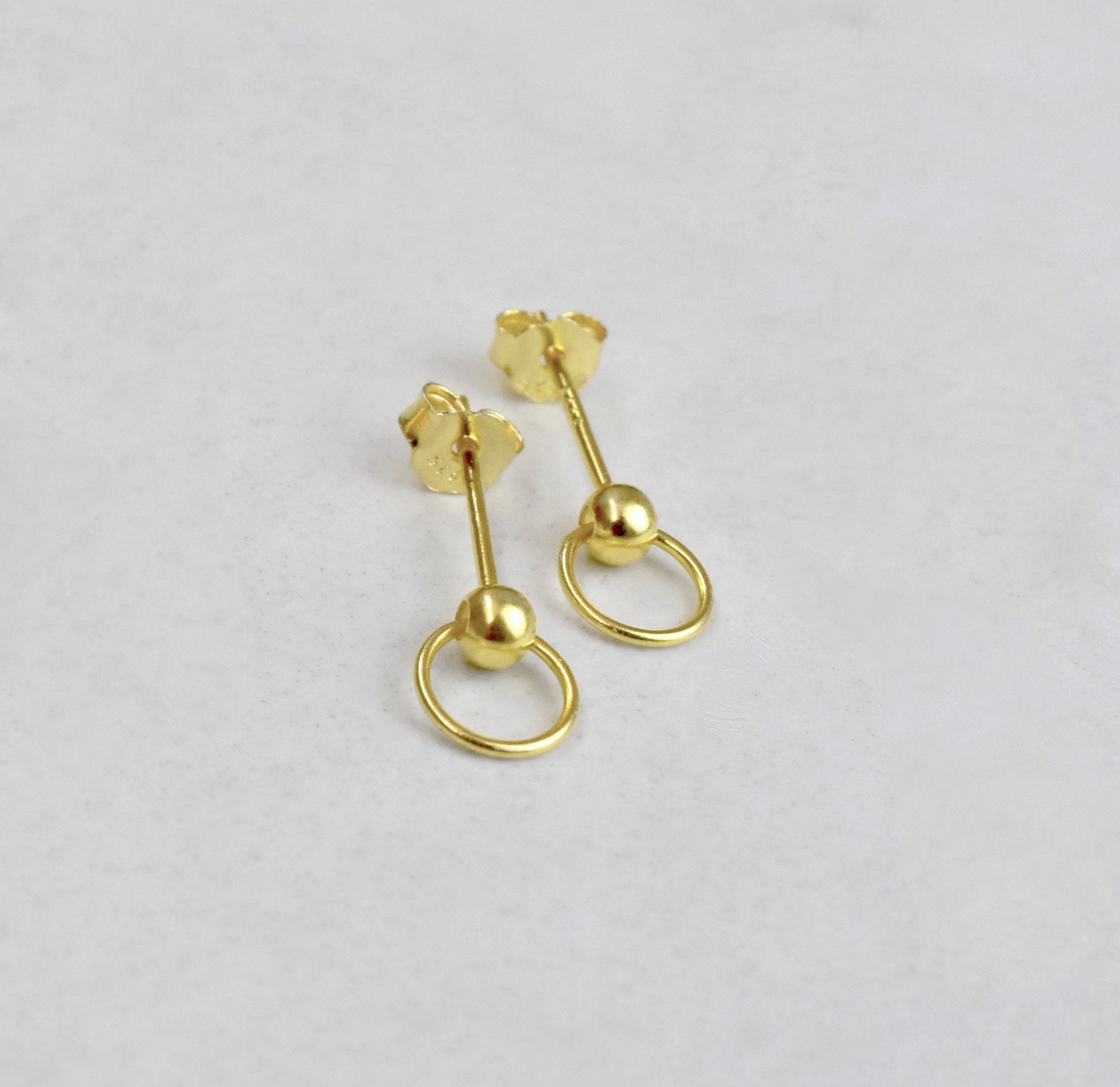 gold door knocker stud earrings