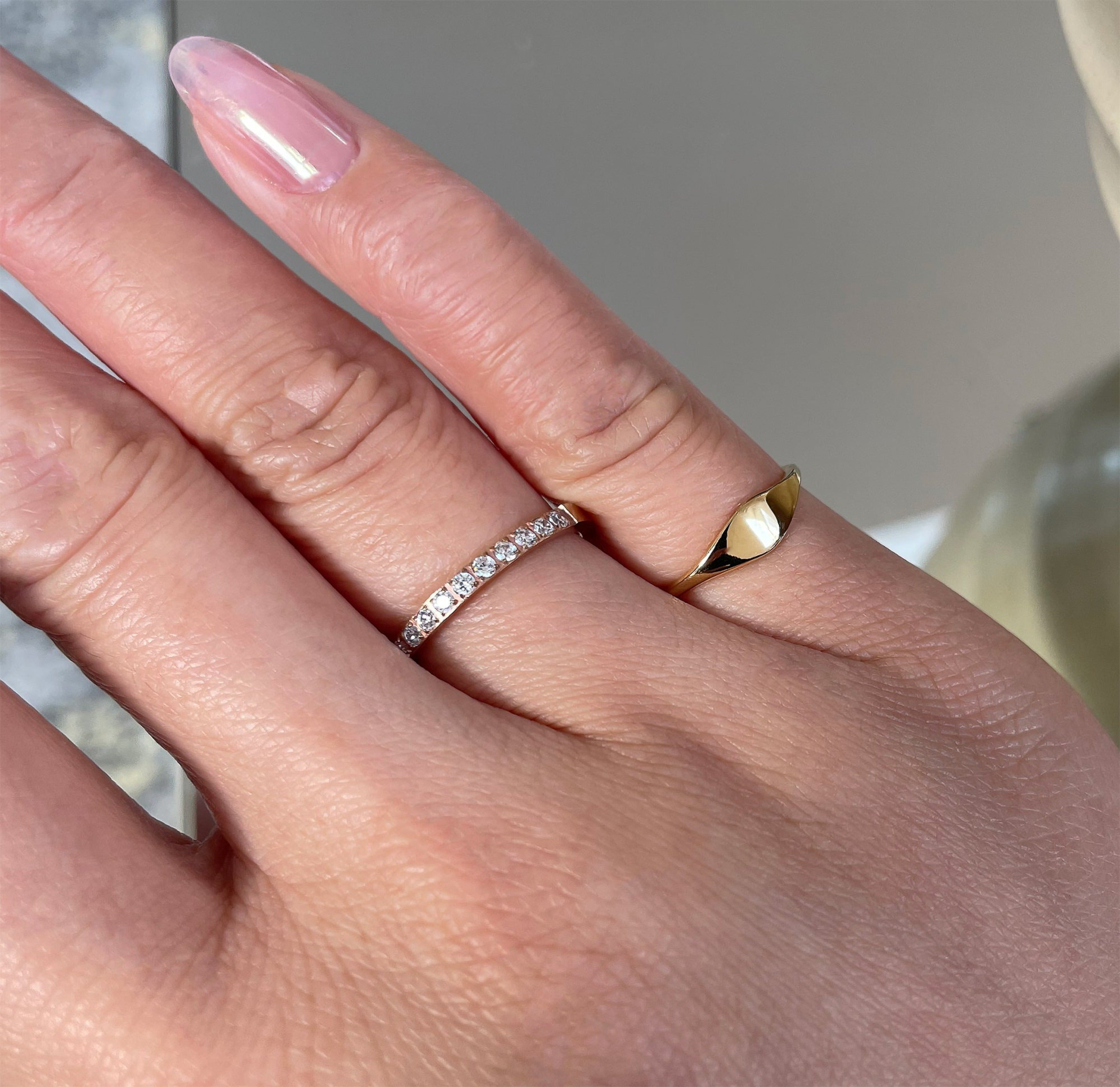 Stella rose gold half eternity ring band   paired with drew signet pinky ring waterproof jewelry