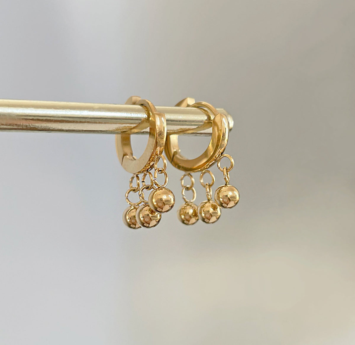gold beaded ball drop huggie earrings