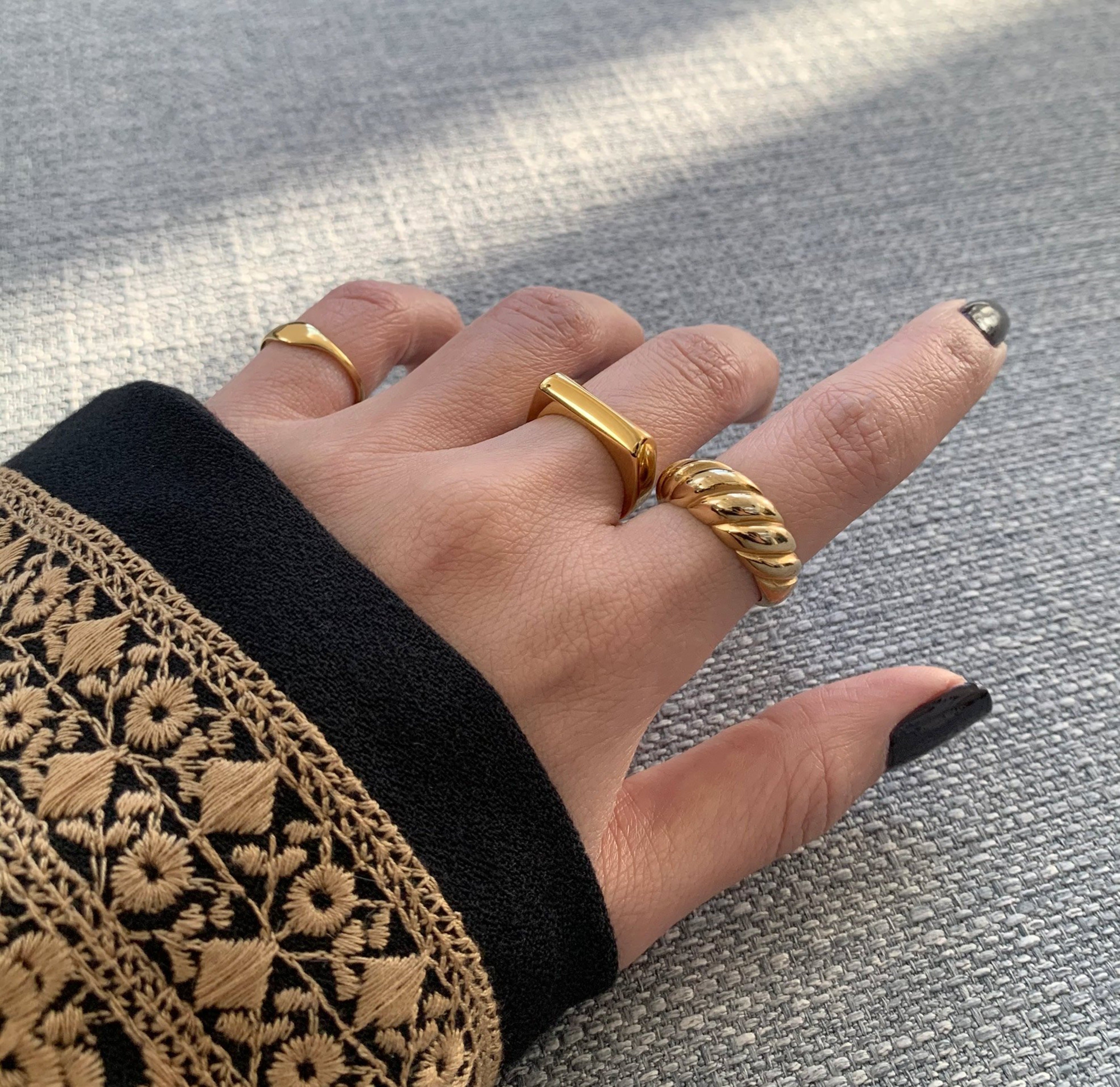 Gold classic croissant ring.worn on model. Waterproof rings