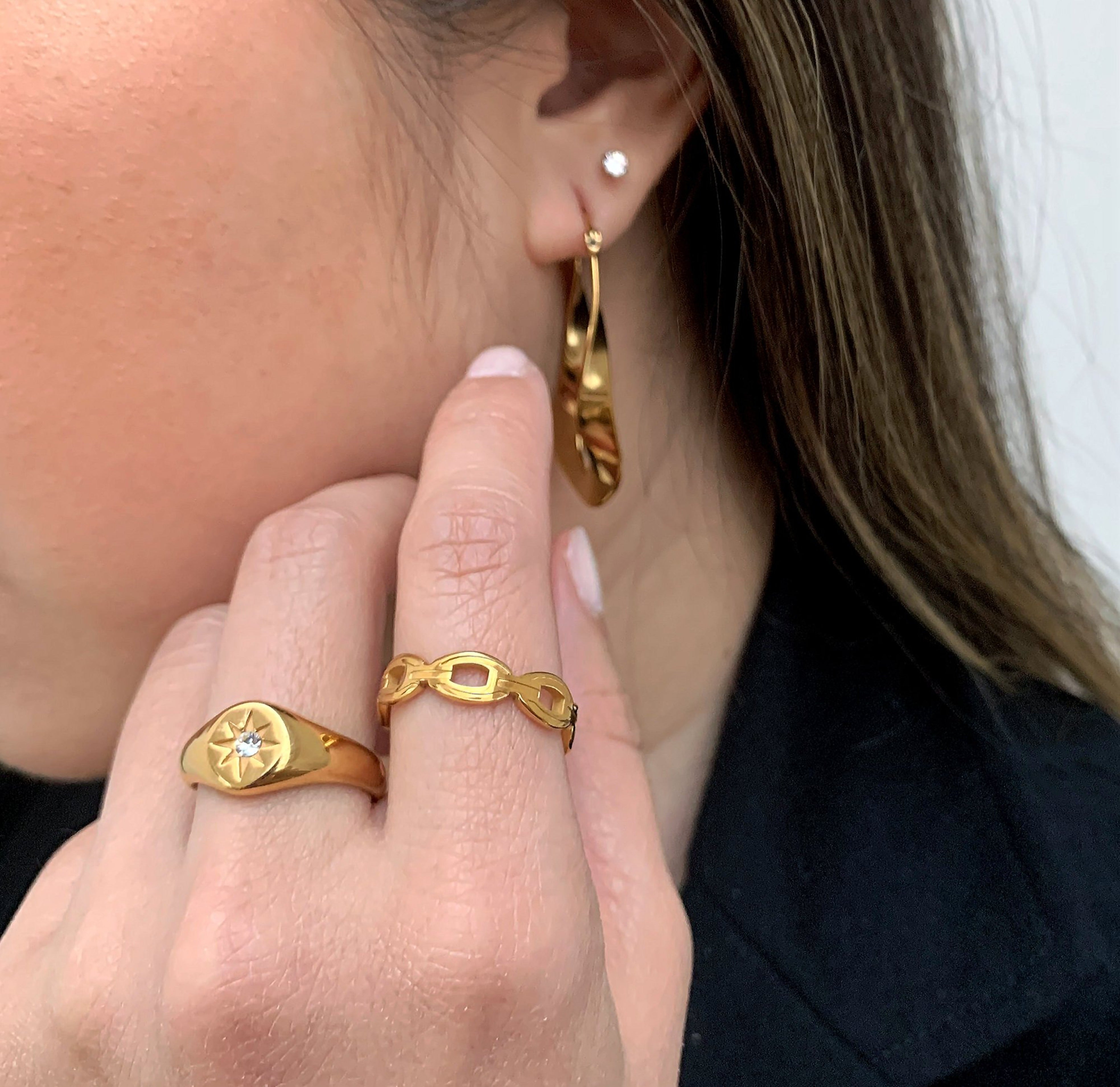 Dylan gold link chain ring, paired with august starburst signet ring worn on model,  watereproof jewelry