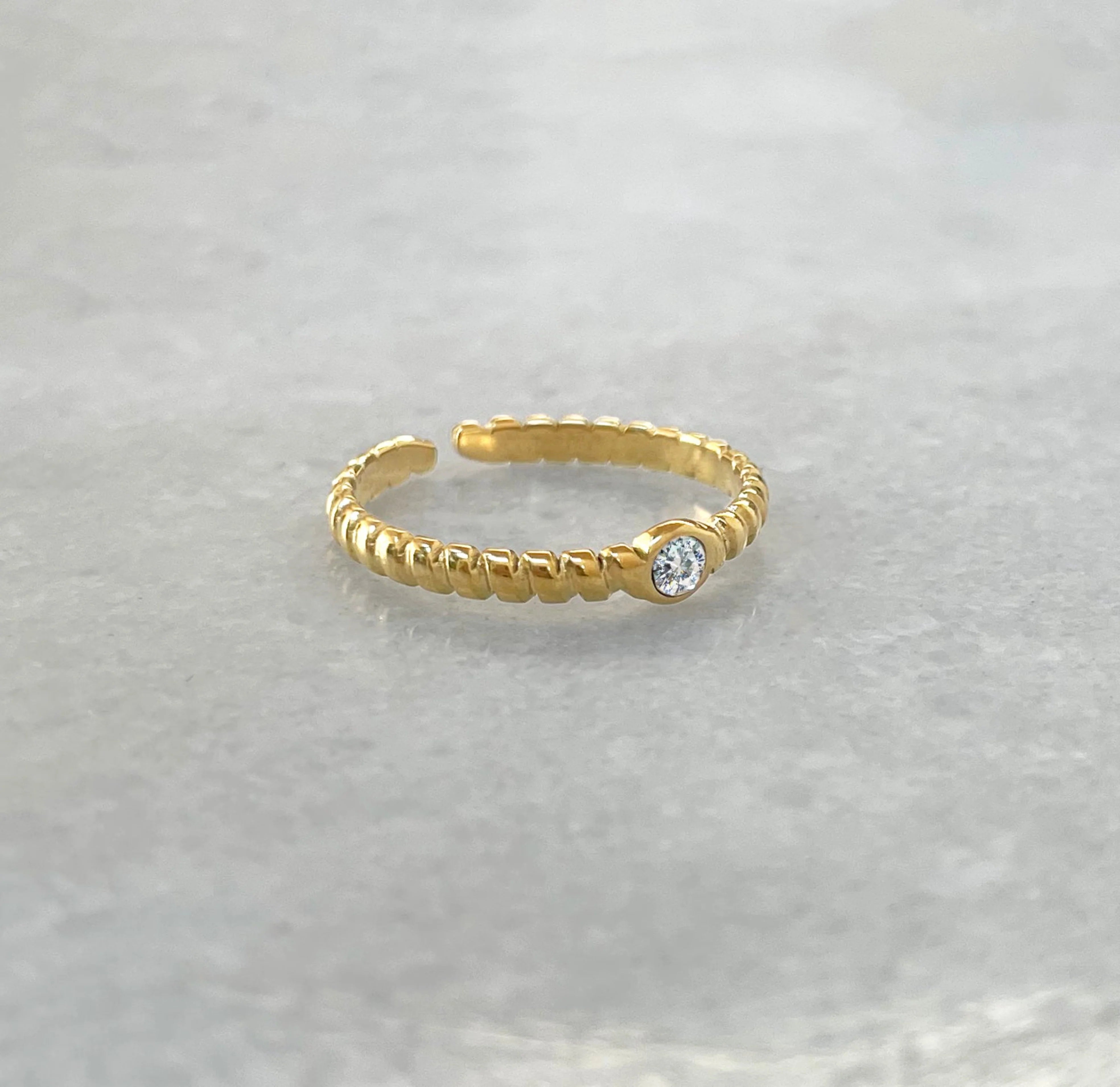 Helena gold adjustable solitaire ring. Gold waterproof jewelry