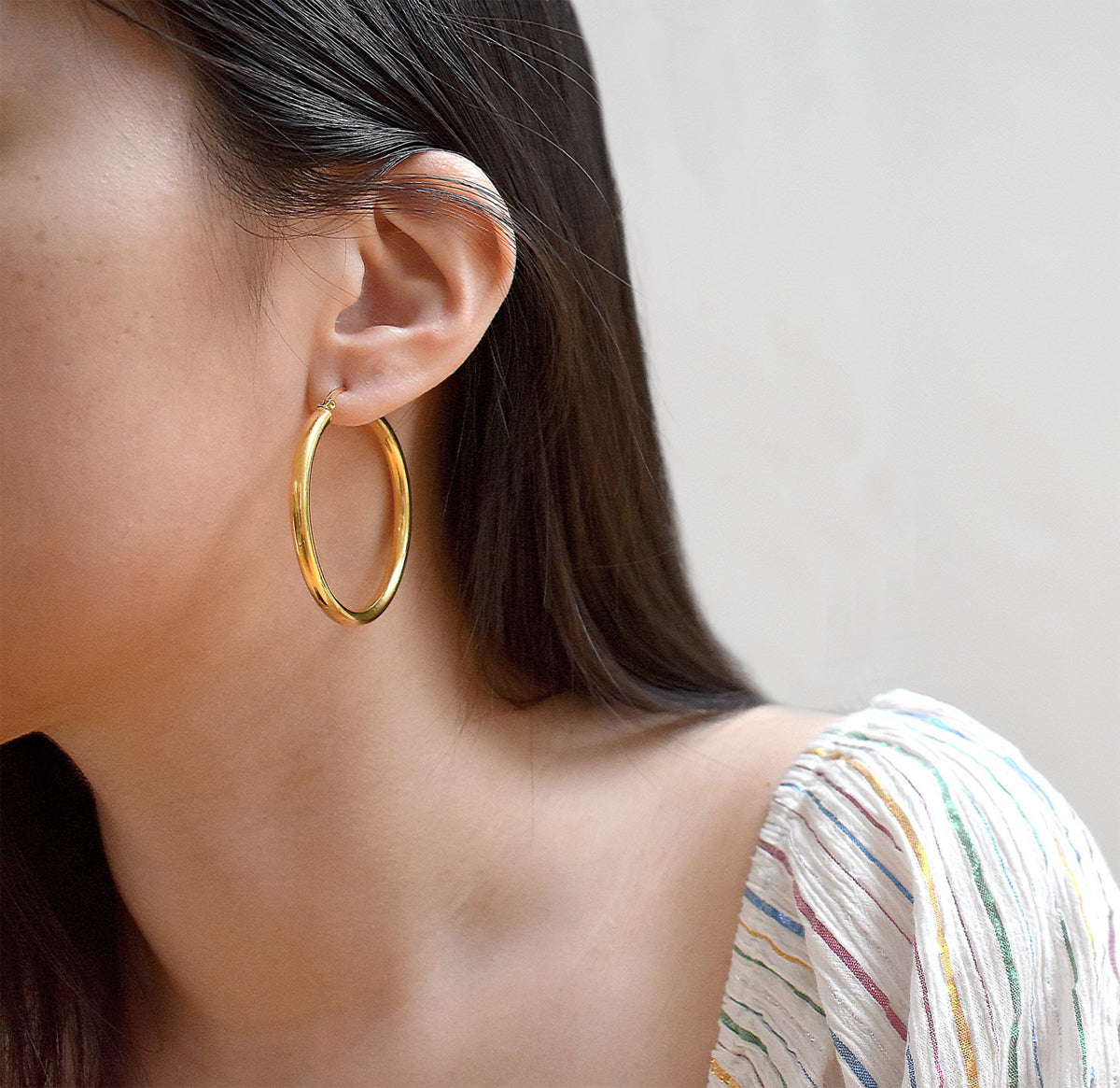 large gold hoop earring