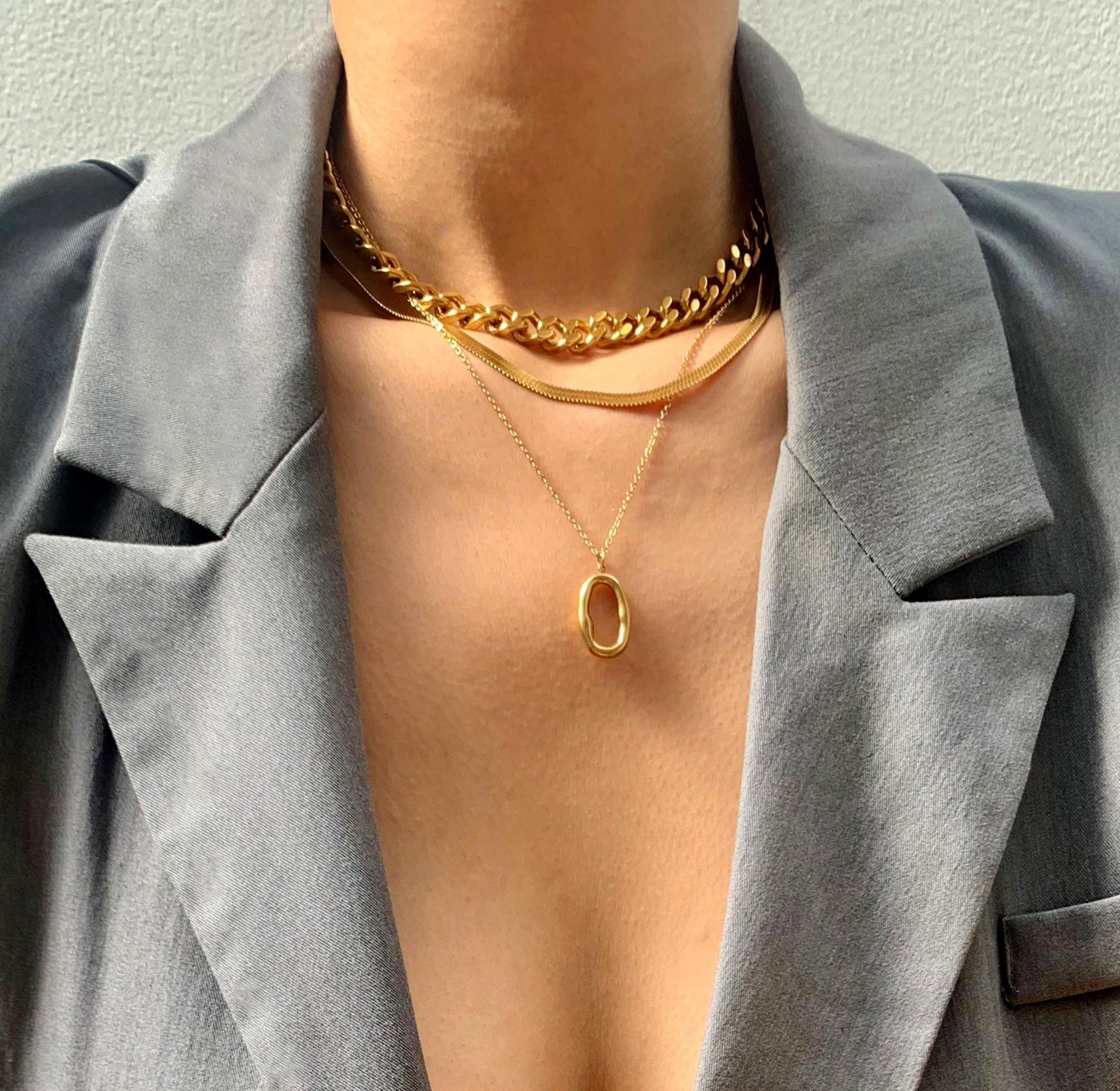 gold o pendant necklace