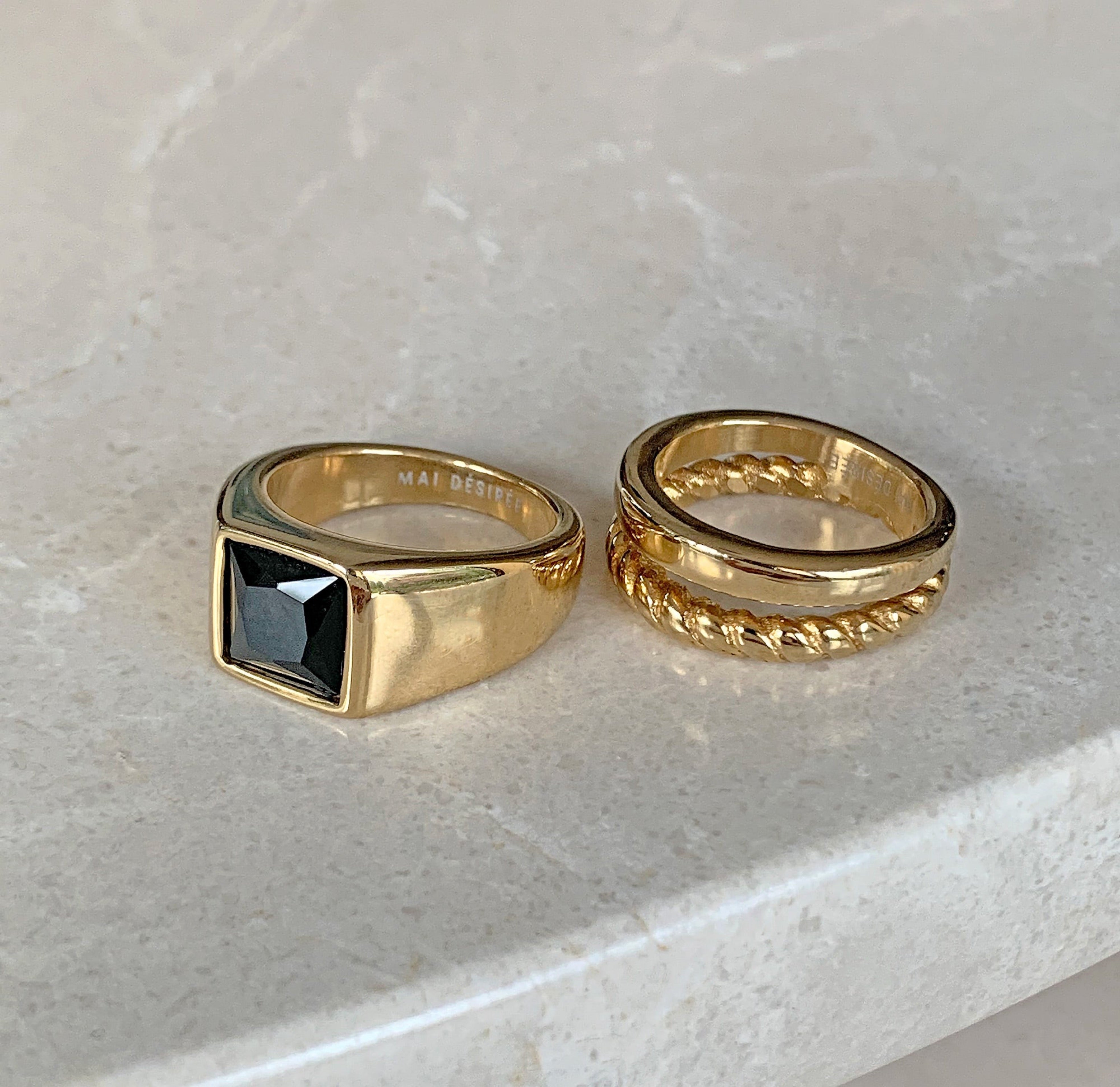 gold onyx signet ring paired with Birdy duo ring. Waterproof jewelry