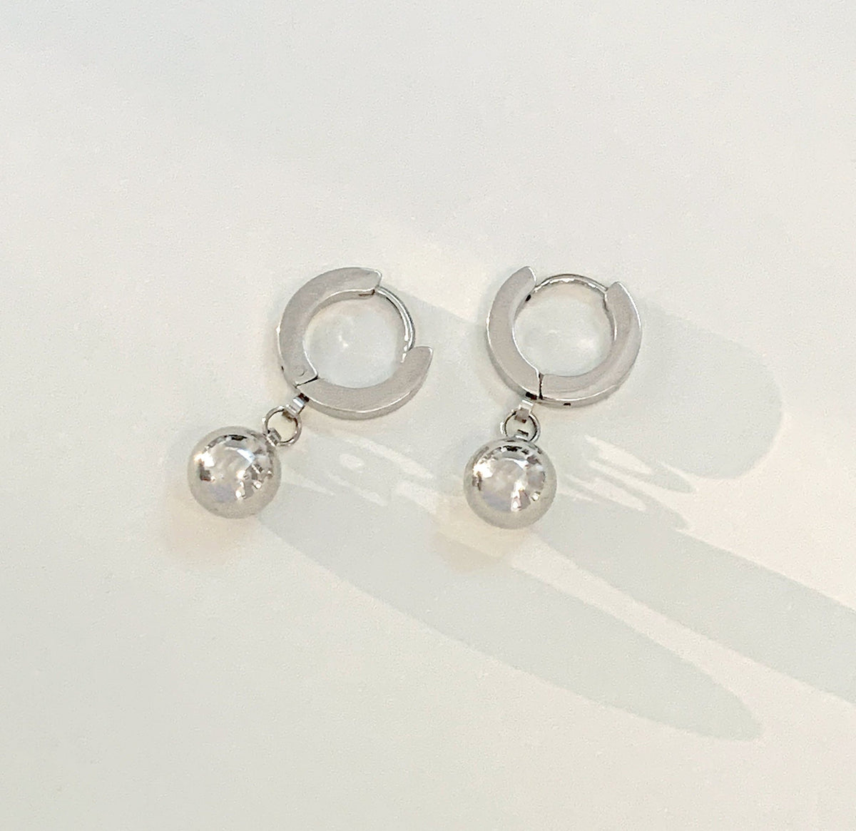 silver ball hoop earrings