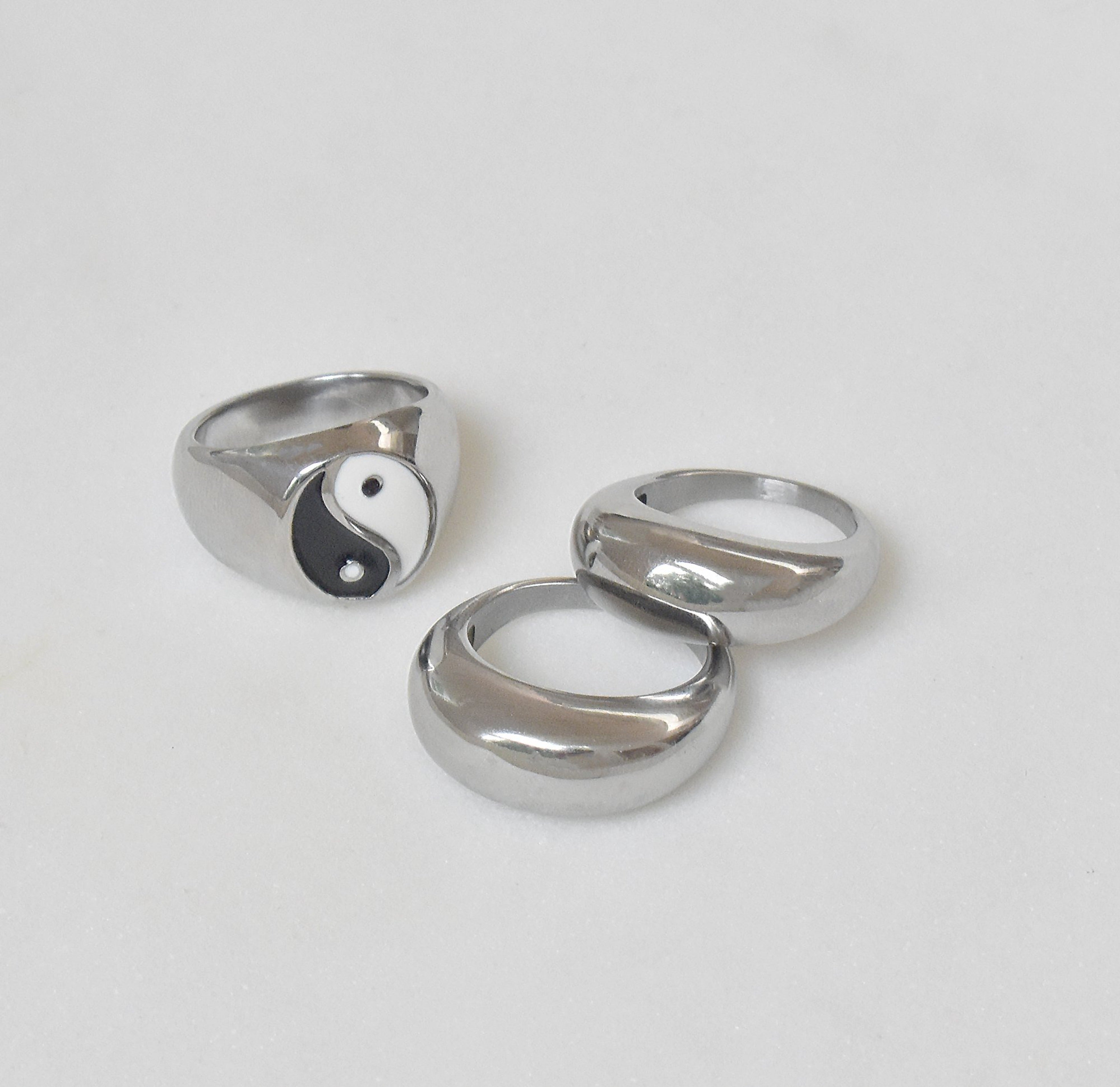 silver dome ring and silver yin yang signet ring. Silver waterproof jewelry