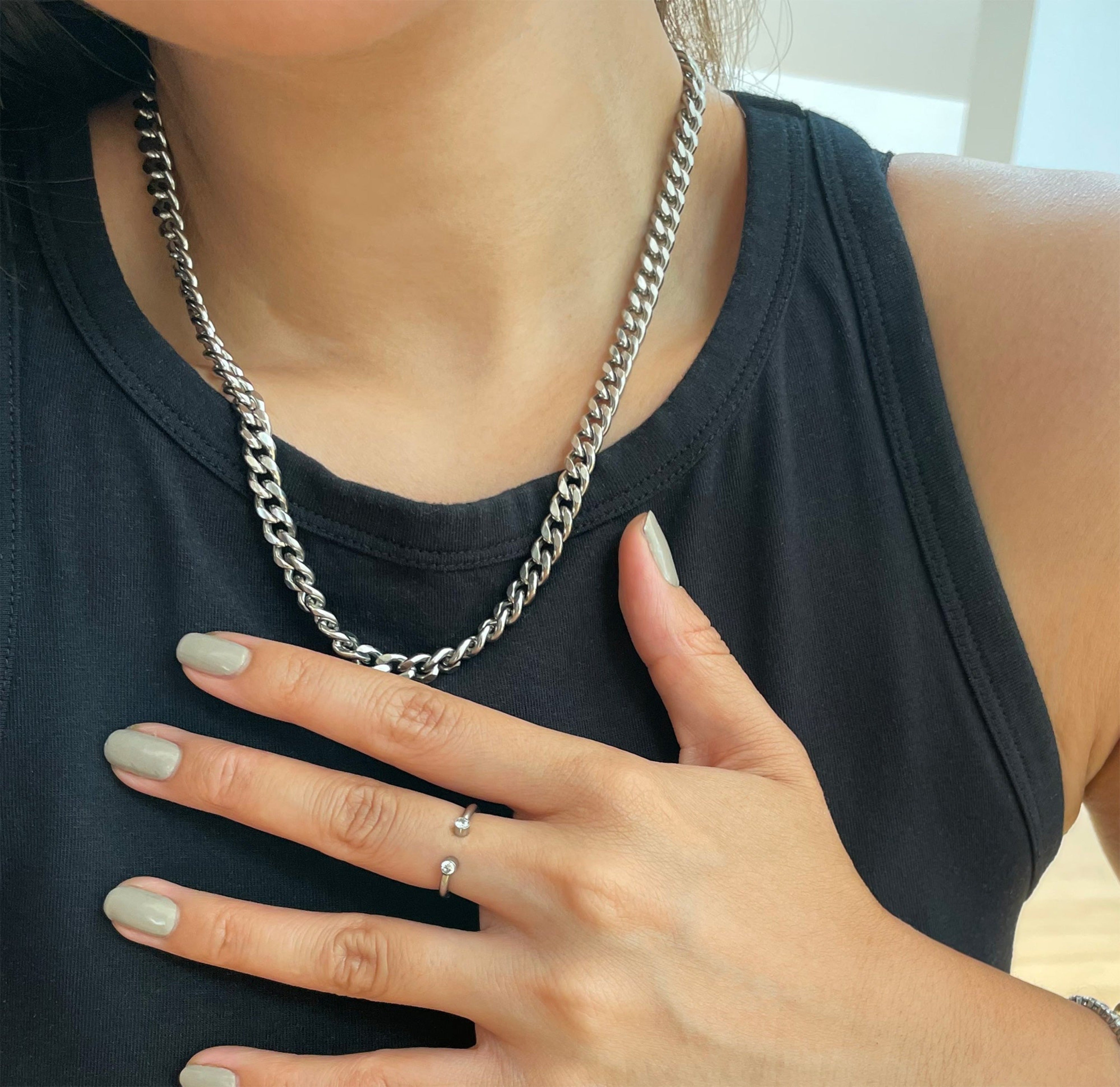 Jolie dainty silver open ring worn on model. Waterproof jewelry