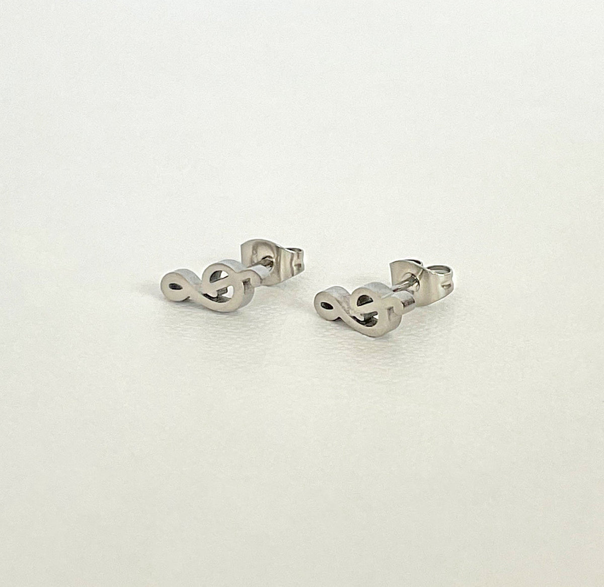 silver treble stud earrings waterproof jewelry