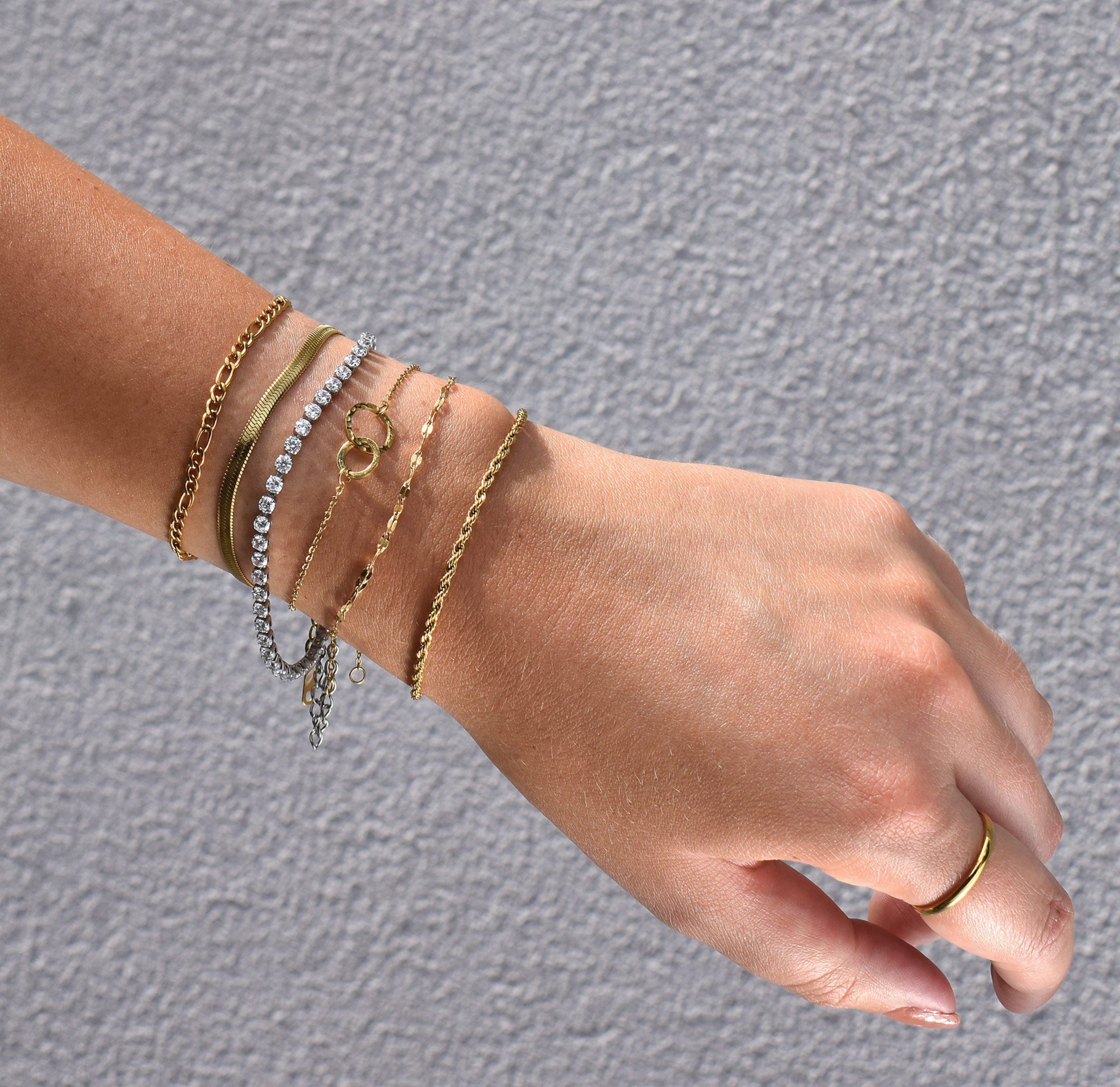 dainty gold unity link bracelet waterproof jewelry tarnish free bracelet stack worn on model