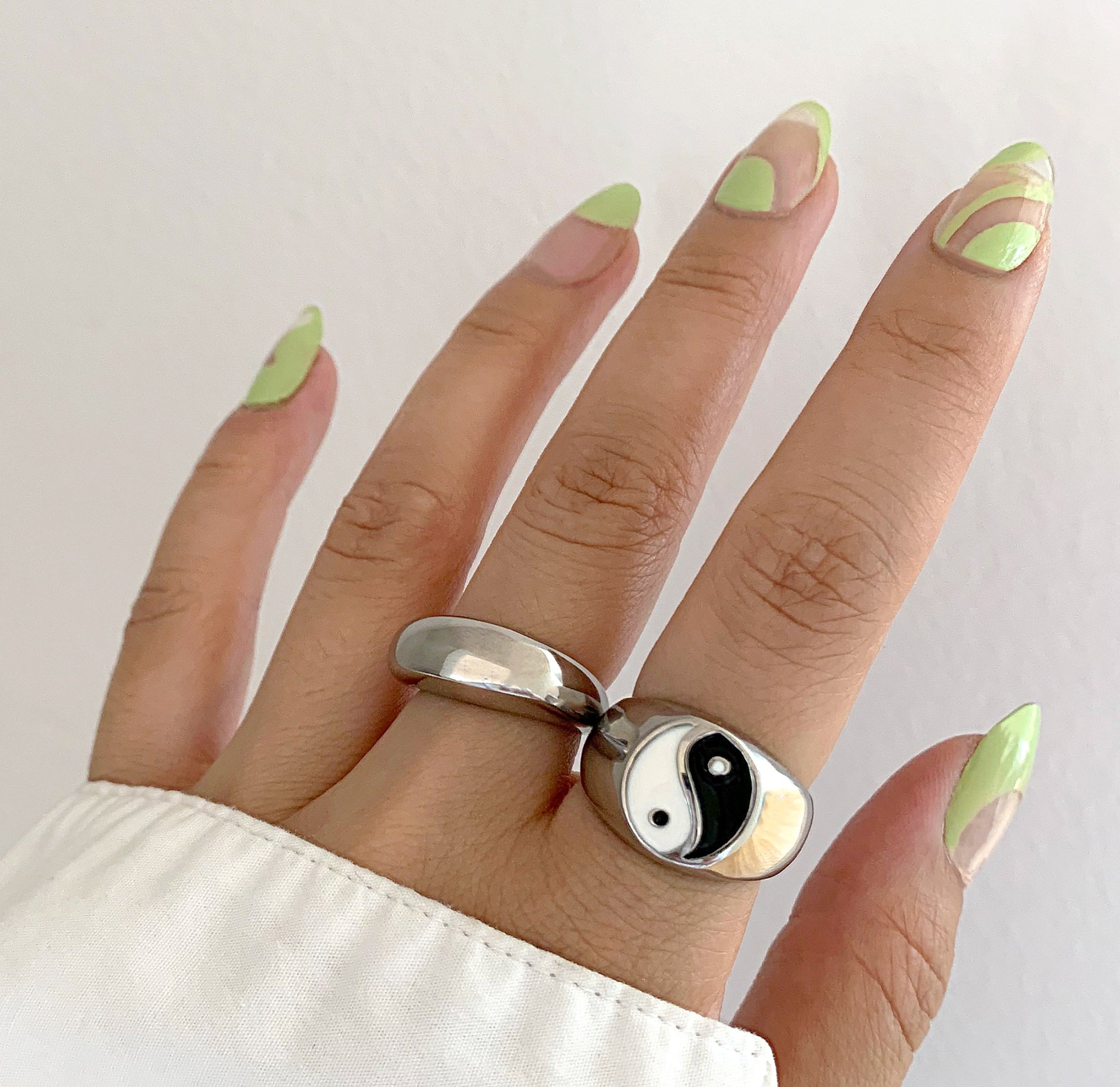 yin yang ring  paired with capri silver dome ring. silver jewelry waterproof